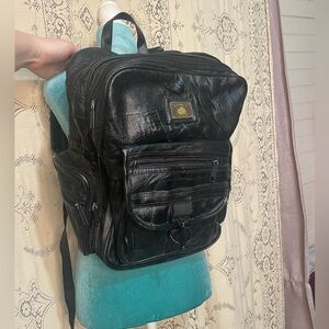 Pioneer express: vintage patchwork leather backpack